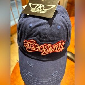 AEROSMITH HAT CAP BLUE WHITE & RED TRIM SCRIPT VINTAGE DESIGN 100% COTTON. NEW